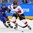 GANGNEUNG, SOUTH KOREA - FEBRUARY 14: Sweden's Rebecca Stenberg #23 reaches to pull the puck away from Switzerland's Dominique Ruegg #26 during preliminary round action at the PyeongChang 2018 Olympic Winter Games. (Photo by Matt Zambonin/HHOF-IIHF Images)

